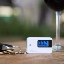 BACtrack Keychain Breathalyzer - Portable Alcohol Tester, Accurate Results, Easy To Use, USB Rechargeable -Home Electronics Store bactrack go keychain breathalyzer white 1 5