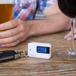 BACtrack Keychain Breathalyzer - Portable Alcohol Tester, Accurate Results, Easy To Use, USB Rechargeable -Home Electronics Store bactrack go keychain breathalyzer white 1 8